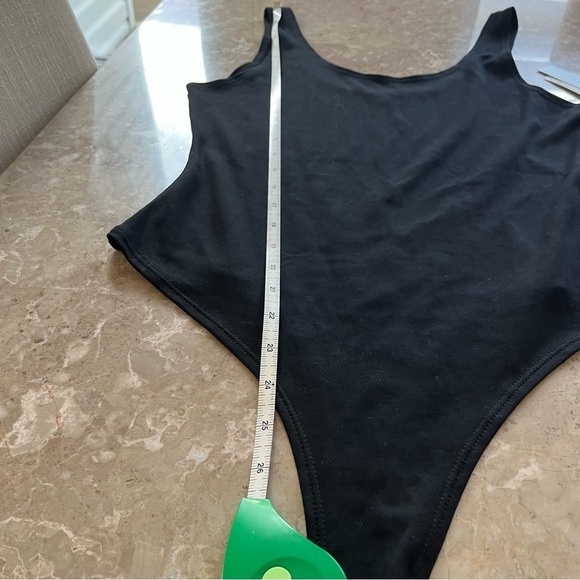 Jo & Co black one piece body suit snap closure and thong back size large - Picture 7 of 10